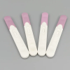 a group of white and pink plastic sticks