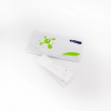 a white rectangular object with green designs on it